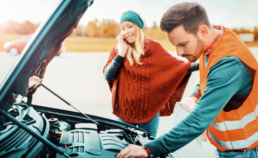 Mechanic fixing car