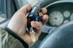 a car key being replaced